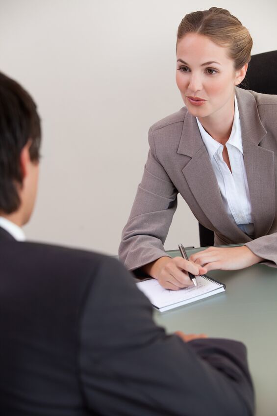 Woman executive interviewing potential truck driving candidate