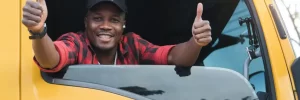 Driver with thumbs up outside window